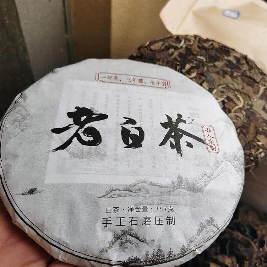 Thé blanc du Yunnan, pressé à la main au graphite, vieu